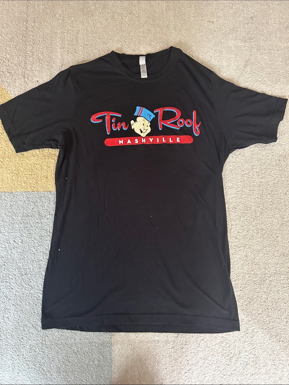 Next Level Apparel Black Tin Roof Nashville Tee with Red & Blue Logo